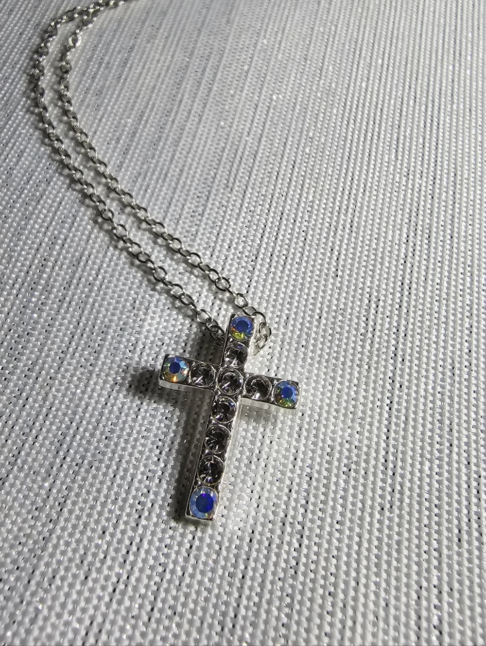 Silver Cross Pendant Necklace with Blue Accent Stones